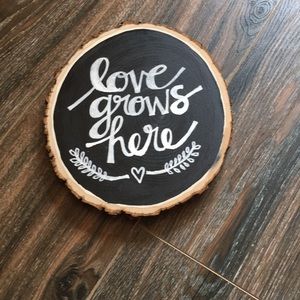 Love grows here sign